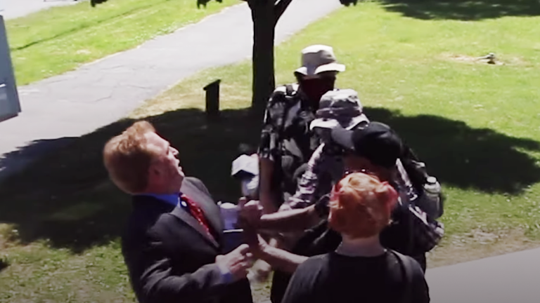 Journalist attacked by masked mob demanding removal of John A. Macdonald statue