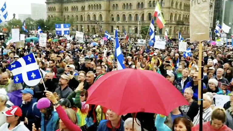 Hundreds flood before Parliament Hill for pro-freedom protest