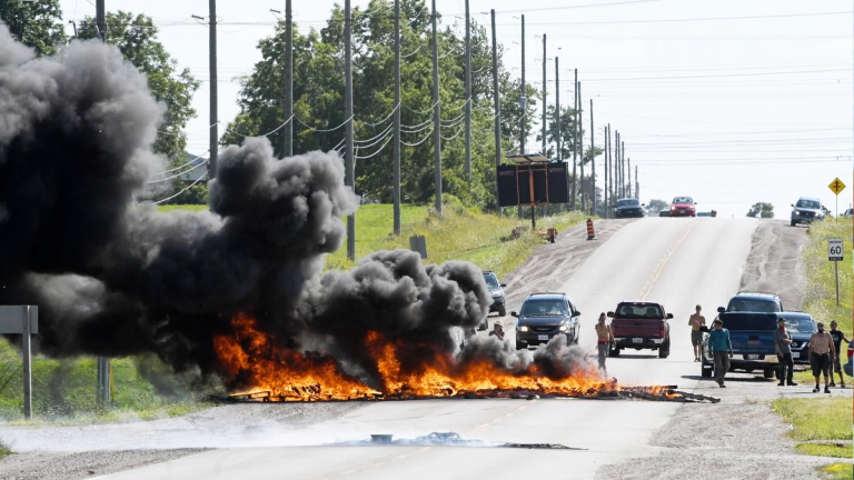 Protesters block highway, rail line over housing project in Caledonia, Ont