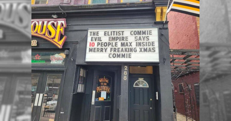 “Merry freaking Xmas commie:” Pub uses sign to protest lockdown