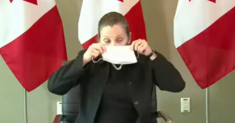 Freeland caught hurryingly putting on a mask prior to press conference