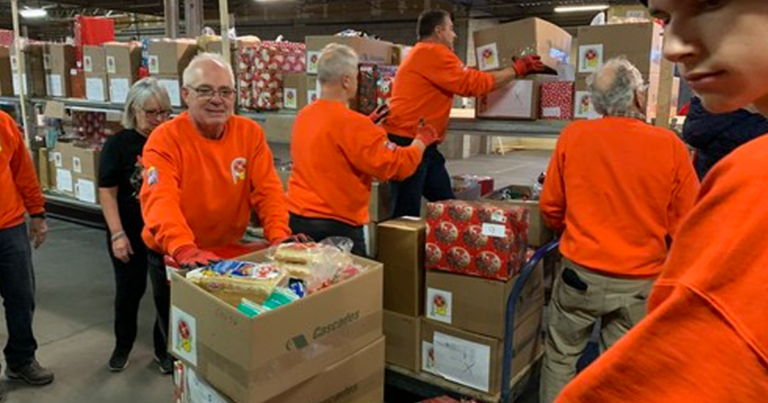 Montreal firefighters deliver food baskets, gifts to 800 families