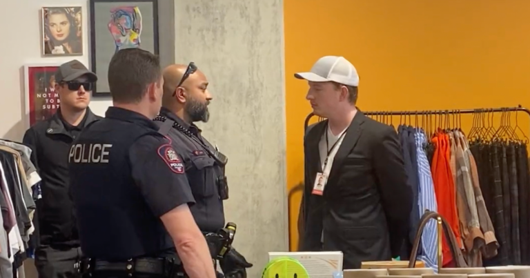 Notley has police remove reporter from press conference