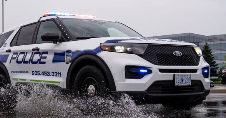 Police arrest three men in bust that recovers 20 stolen luxury trucks